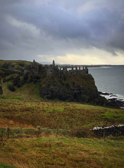 Guided tour group at Dunluce Castle